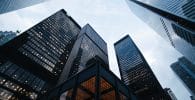 Business Environment. low angle photo of city high rise buildings during daytime