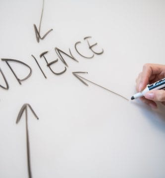 CPA Marketing, person writing on white paper